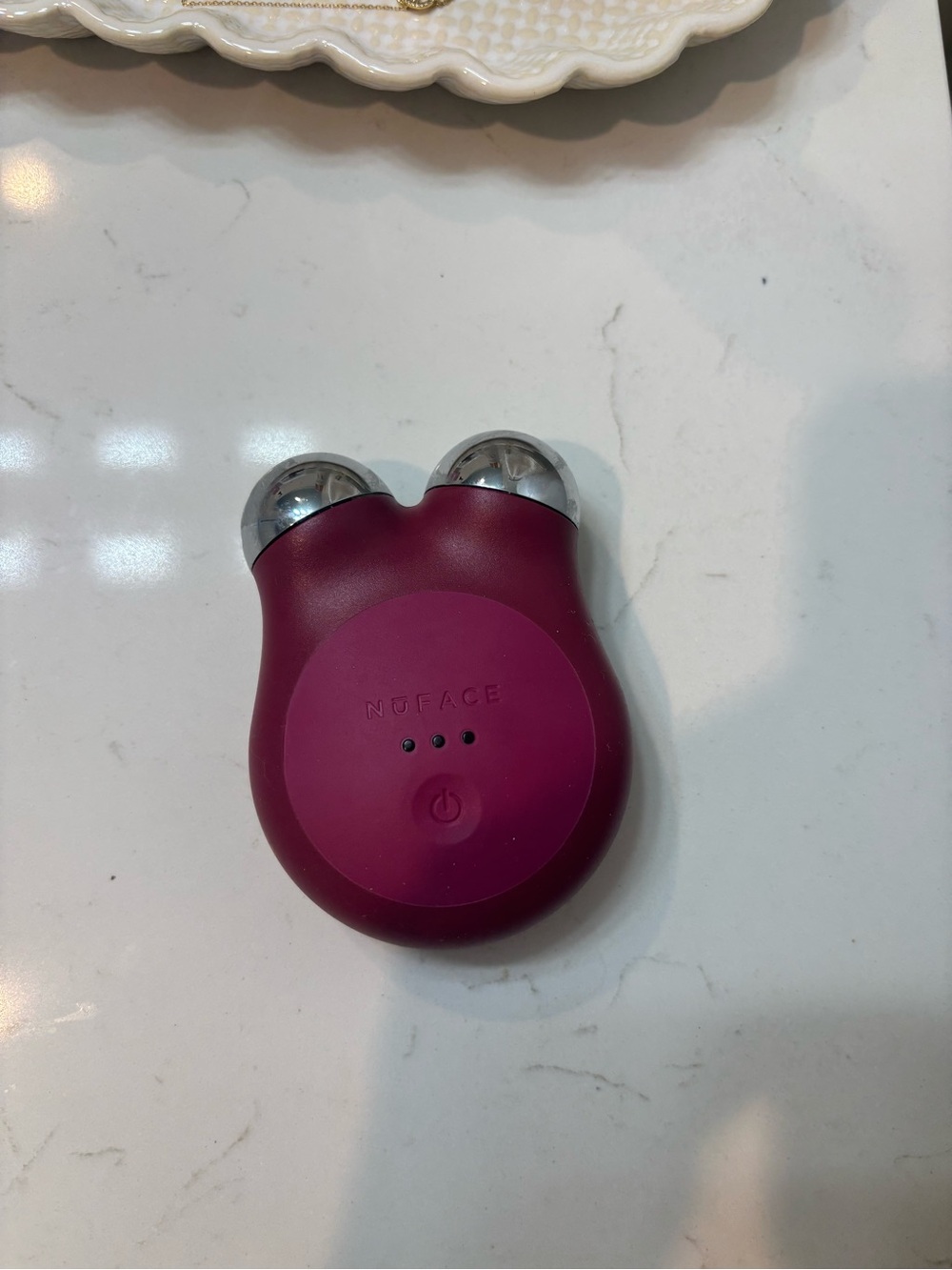 NuFACE Mini Facial Toning Device in Deep Plum with Silver Spheres